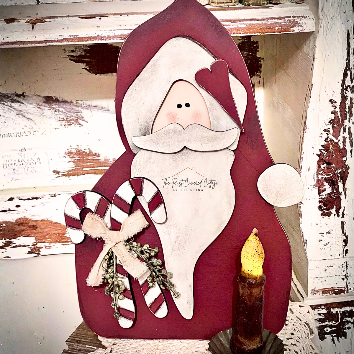 Finished Primitive Santa with red hat and candy canes