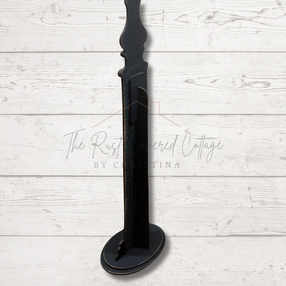 Angled view of finished black Post Sign and Ornament Holder and base