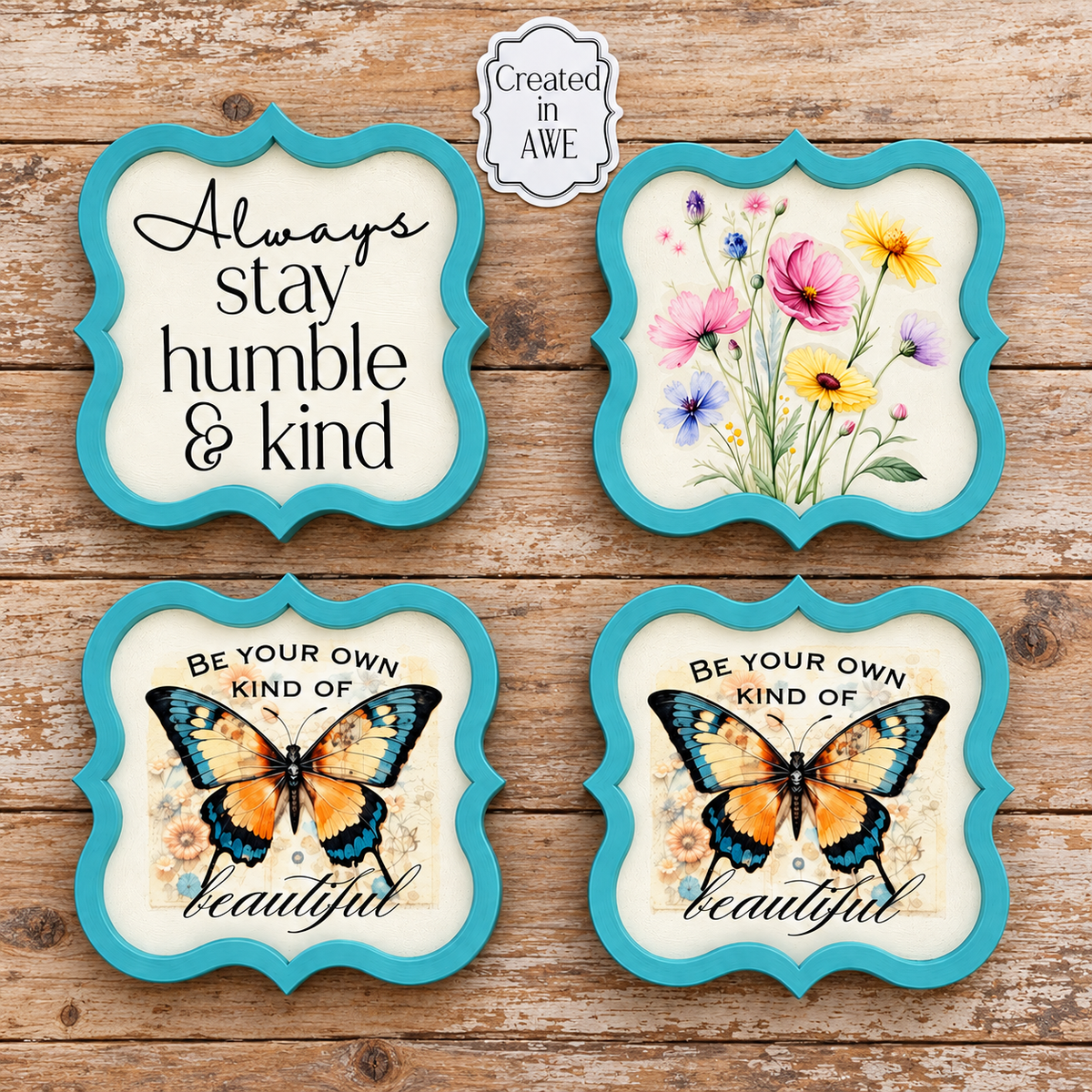 Set of four aqua framed coasters featuring floral, inspirational, and butterfly designs displayed on a worn wood background.