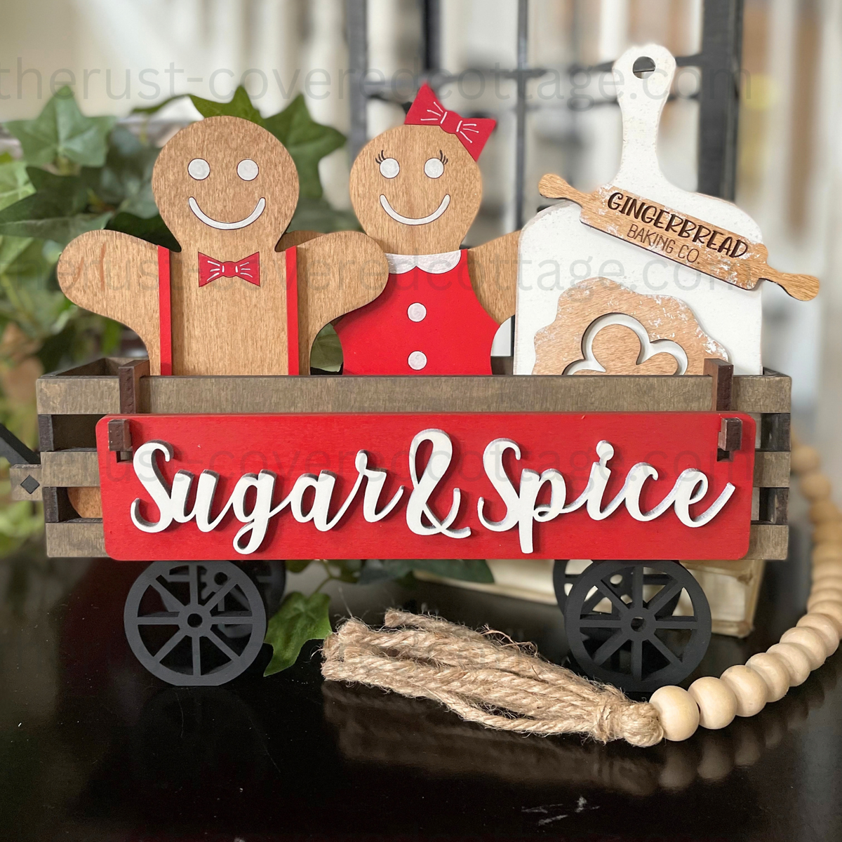 Finished Gingerbread Insert in a wagon with gingerbread boy and girl, cutting-board accent, and Sugar and Spice plaque