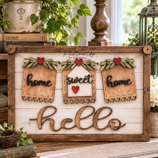 Finished Home Sweet Home interchangeable banner featuring three wood banner pieces with red hearts and greenery on a rustic Hello sign base, styled in a bright vintage cottage setting with books, plants, flowers, and warm wood accents.