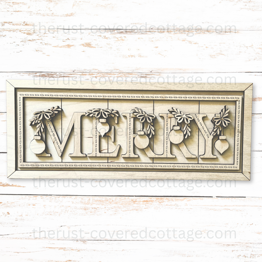 Unfinished Merry Stitched Sign wood kit with MERRY letters, hanging ornaments, bows, leafy sprigs, and decorative stitch details on the letters and border.
