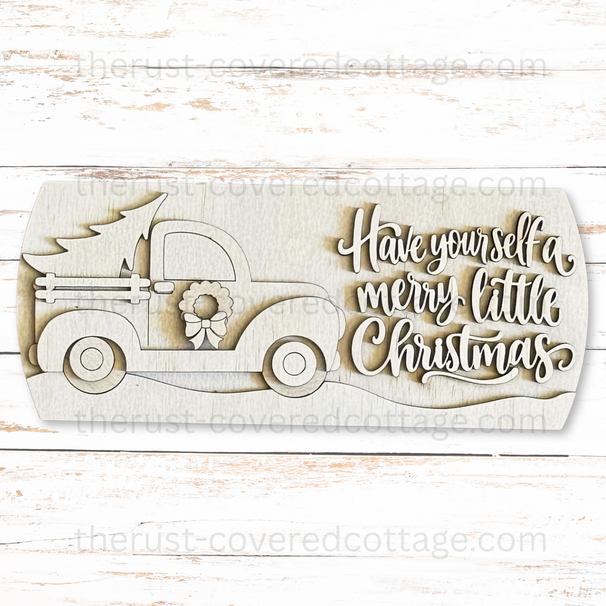 Unfinished Merry Little Christmas Interchangeable Round Insert with a tree-carrying pickup, a wreath and bow, and Have yourself a merry little Christmas lettering.