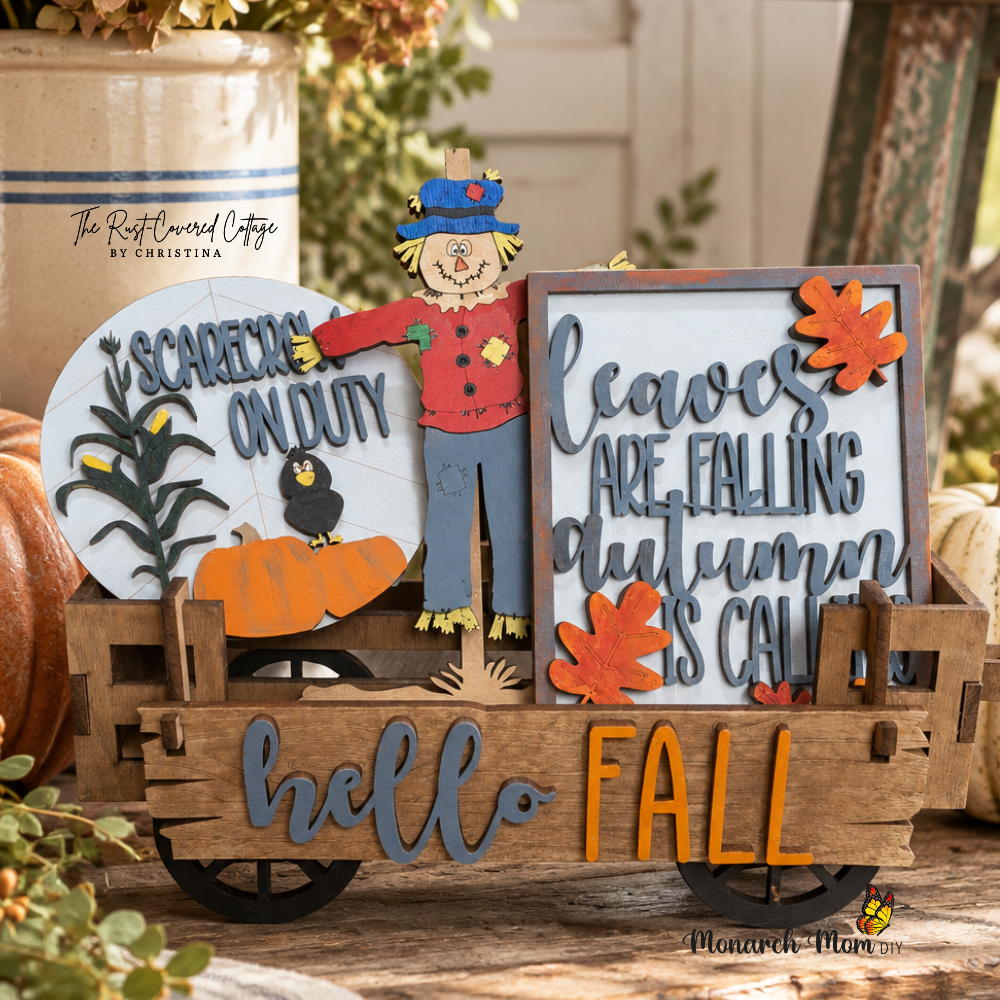 Scarecrow on Duty Interchangeable Wagon insert displayed in a styled fall vignette with pumpkins, vintage decor, and warm autumn accents.`