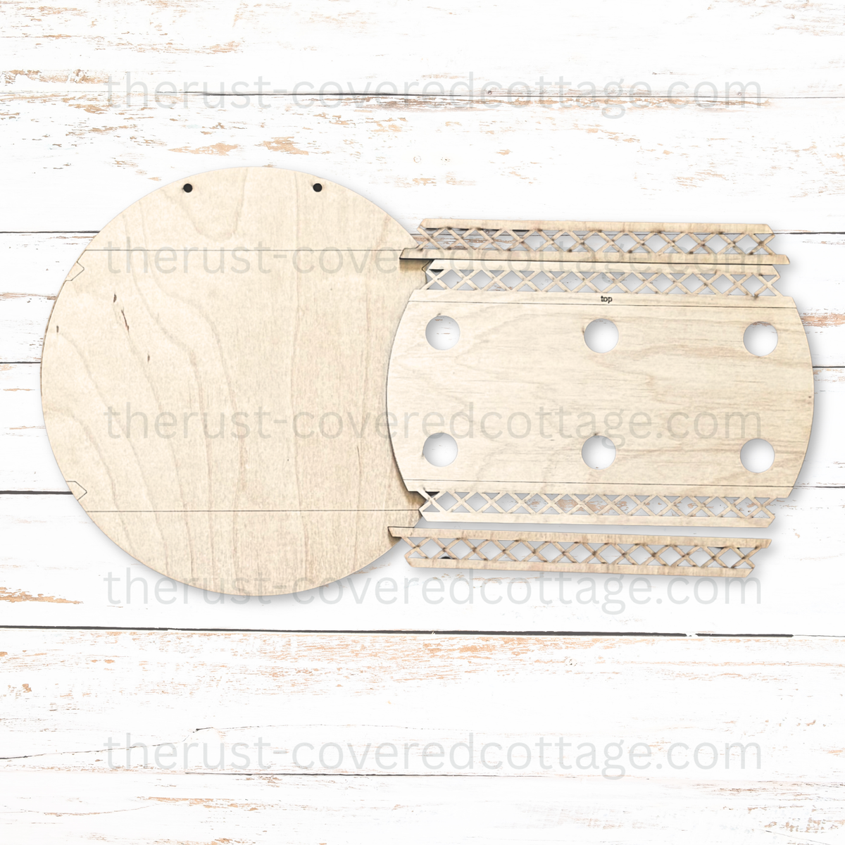 Unassembled Interchangeable Round Base wood pieces showing a round backer and separate overlay pieces with lattice-style trim.