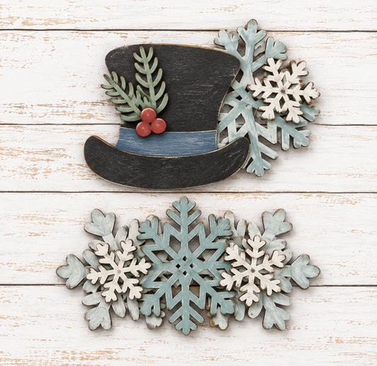 Finished Winter Cottage Drawer Insert with black top hat greenery red berries and layered blue and white snowflakes