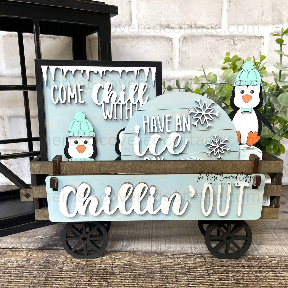 Chillin' Out Insert with penguins and winter signs displayed in finished Interchangeable Wagon Base
