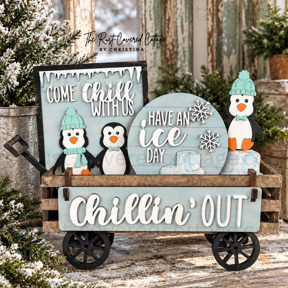 Chillin' Out Insert displayed in Interchangeable Wagon Base with three penguins and winter signs