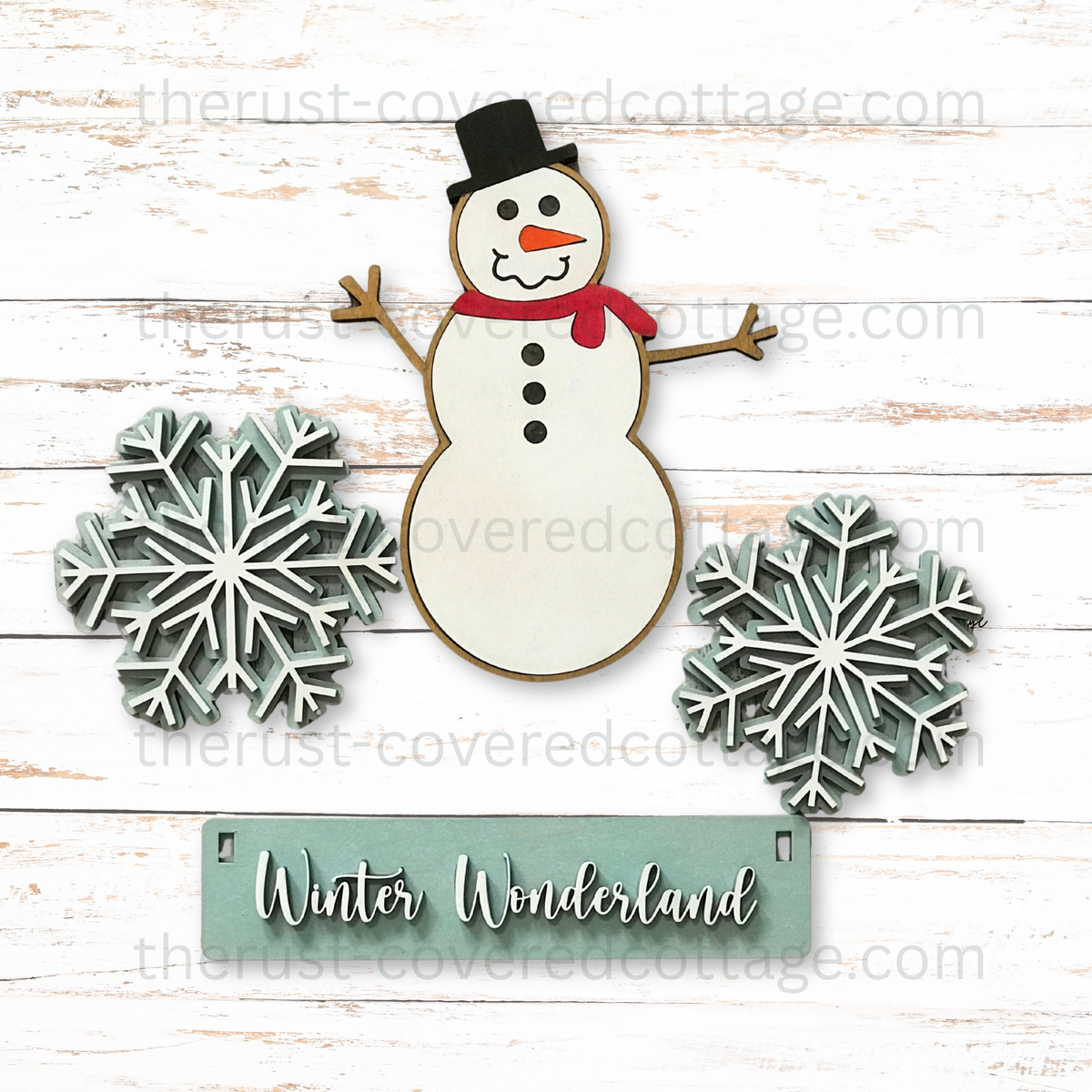 Finished Winter Wonderland Insert with snowman layered snowflakes and Winter Wonderland sign